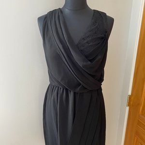 Sleeveless black dress with lace detail